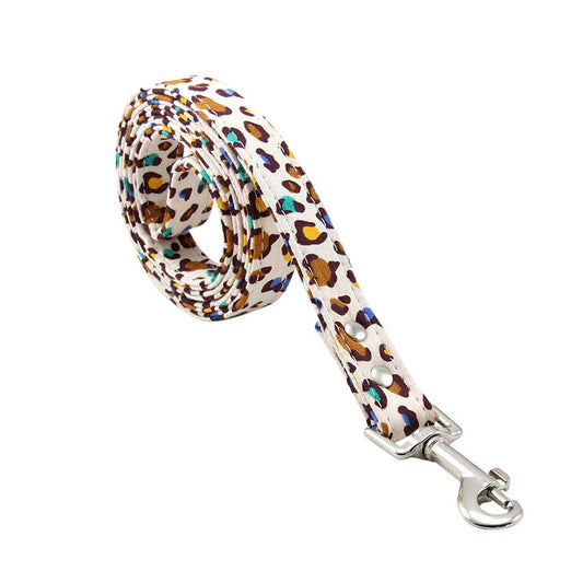 Rolled leopard print dog leash showing metal swivel clip