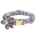 Load image into Gallery viewer, Light blue floral dog collar with gold buckle and bow accessory
