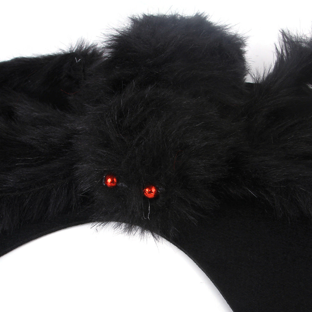 Back view of black and red spider pet costume harness displayed on black dog mannequin