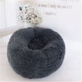Load image into Gallery viewer, Dark gray round plush pet bed shown in a clean indoor setting

