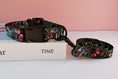 Load image into Gallery viewer, Green nylon dog collar and leash with butterfly pattern and black hardware on white box
