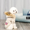Load image into Gallery viewer, Small white dog sitting wearing beige winter dog coat with faux fur hood
