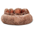 Load image into Gallery viewer, Light brown bear paw shaped plush pet bed displayed alone on wooden floor

