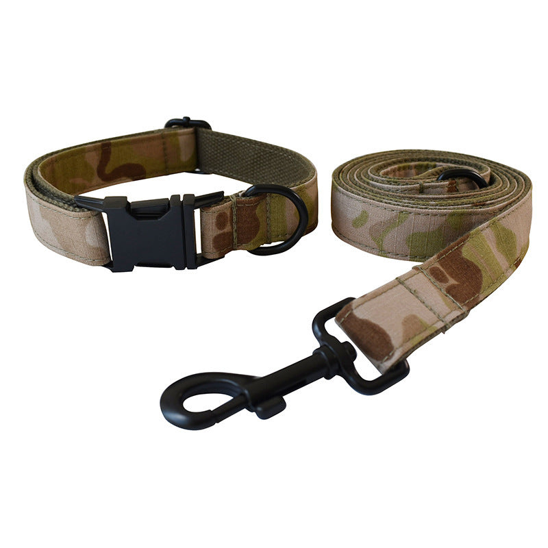 Camouflage dog collar with black plastic buckle and leash with metal clasp side by side