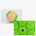 Load image into Gallery viewer, Green and beige rubber chew ball with hole in hexagonal textured surface
