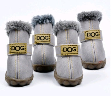Pair of light gray dog boots with faux fur lining and visible stitching