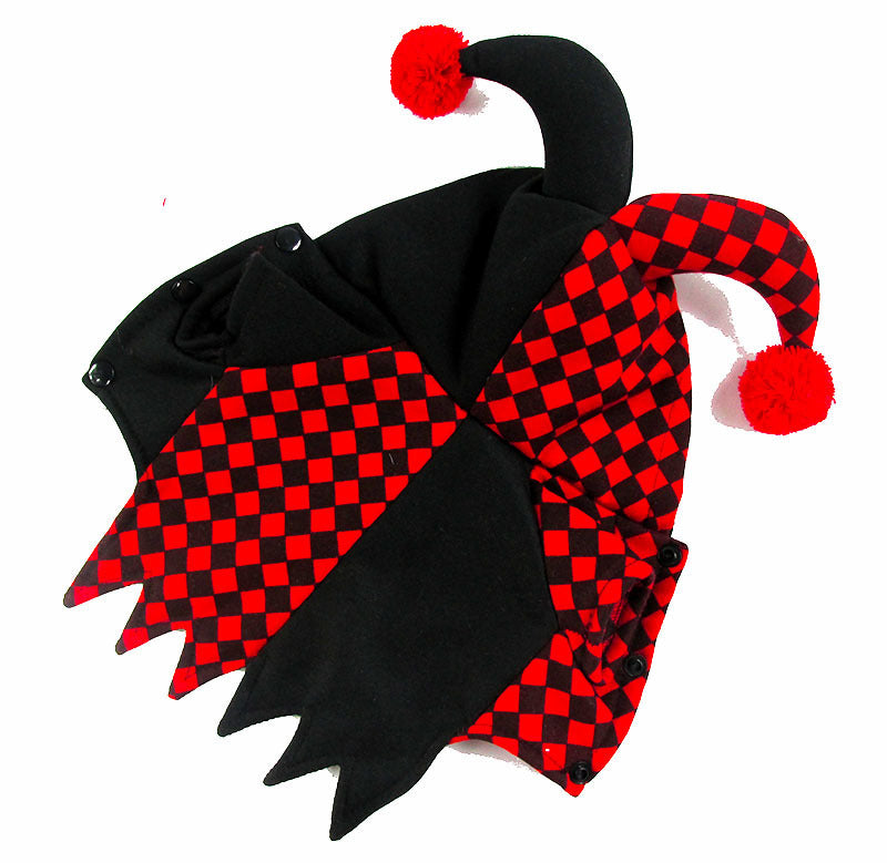 Flat lay of jester pet costume with snap buttons and horned hood featuring red pompoms
