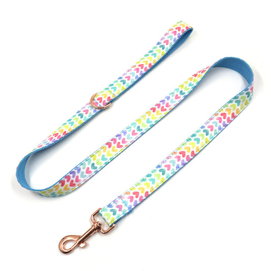 Extended view of leash with heart print and rose gold clasp