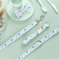 Load image into Gallery viewer, Flat lay of coordinating leash and collar with bow tie alongside white dish and cutlery
