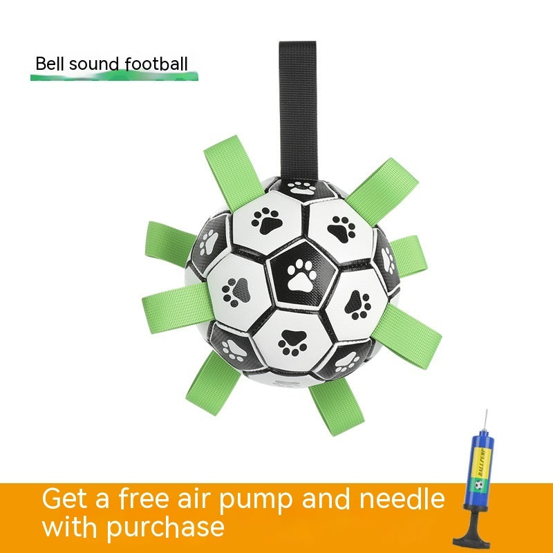 Black and white inflatable dog toy ball with paw prints and green loops and free air pump for inflation