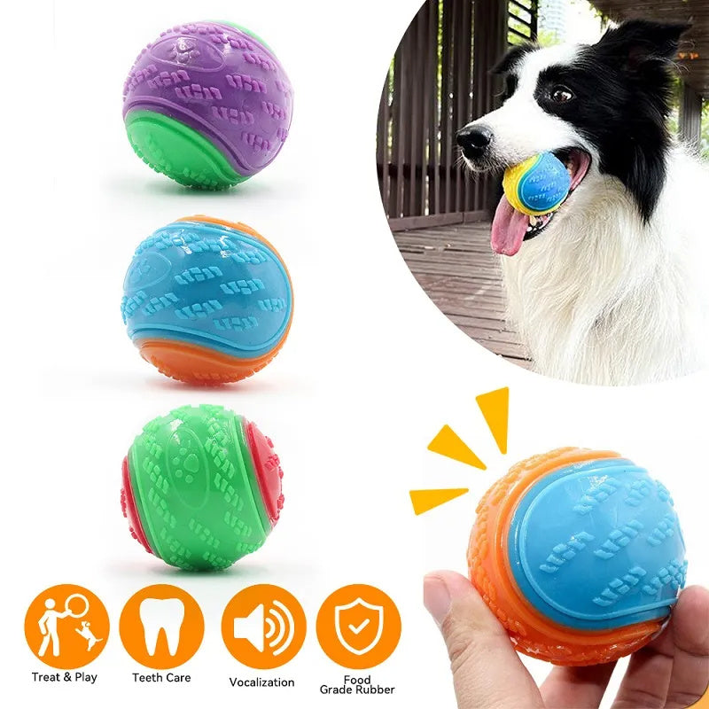 Colorful durable dog chew toy balls in various dual-color combinations including purple-green, blue-orange, and red-green; textured surface for dental care