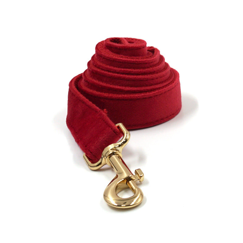 Red velvet pet bow tie accessory on white background