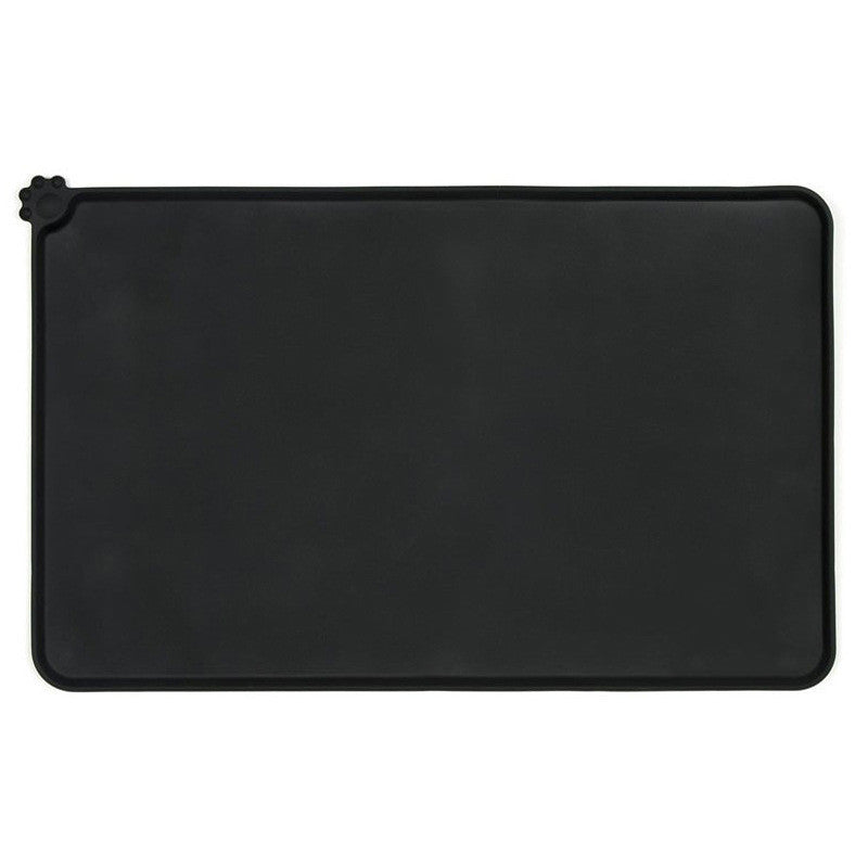 Durable silicone pet feeding mat laid flat, displaying spill-resistant edges  