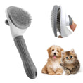 Load image into Gallery viewer, Gray pet grooming brush showing release button in action
