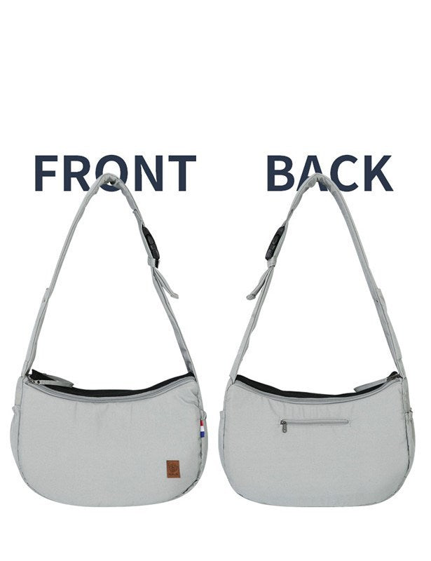 Front and back views of light gray pet travel shoulder bag highlighting zippered pocket on back