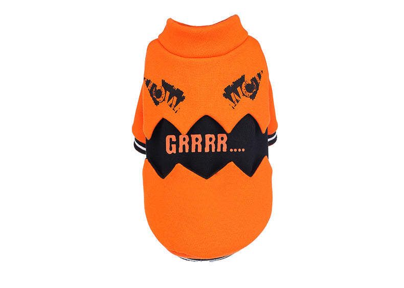 Flat lay of orange pumpkin dog sweater with 'GRRRR...' text and jagged black detail