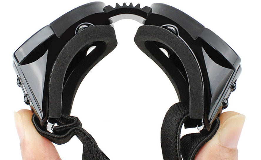 Side view close-up showing black pet goggles' strap attachment