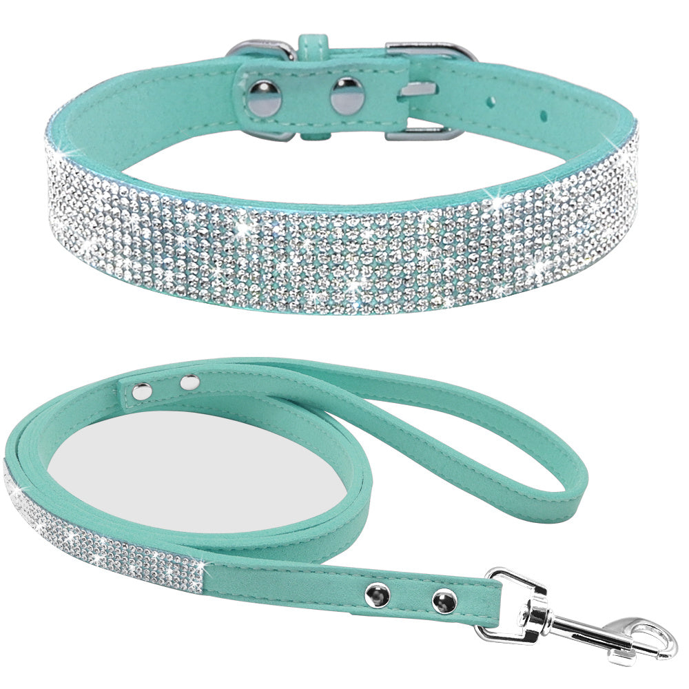 Blue crystal-embellished dog collar and matching leash set on white background