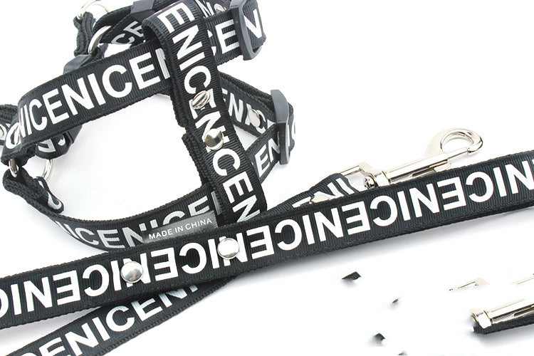 Black nylon dog harness and leash featuring NICENICENICE print and metal clasp