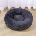 Load image into Gallery viewer, Dark gray plush pet bed with soft fluffy texture placed on wooden floor near sheer curtains
