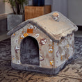 Cargar la imagen en la vista de la galería, Light brown plush pet house with cartoon dog patterns on carpet
