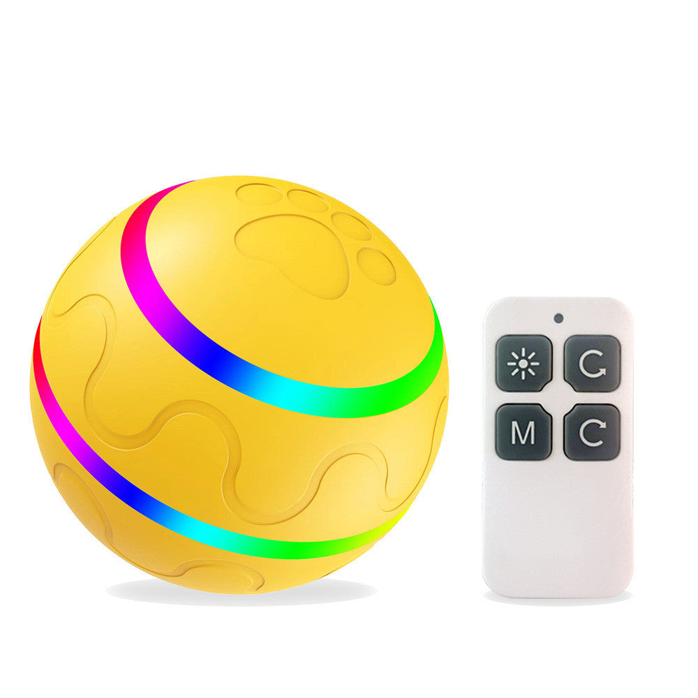 Yellow intelligent cat ball with paw print design and LED light strips next to a white remote control