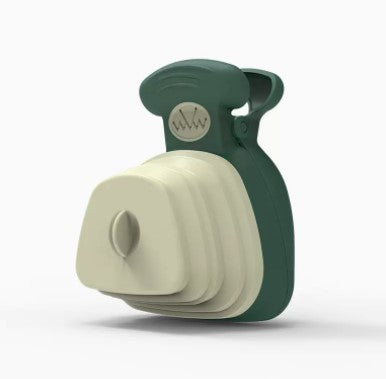 Green and gray foldable dog poop spoon dispenser angled view