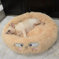 Load image into Gallery viewer, Beige plush round pet bed with an embroidered face and small dog resting inside
