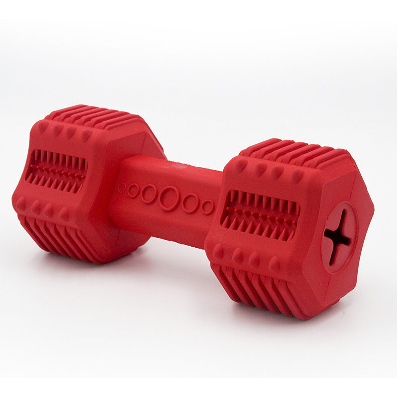 Red rubber dumbbell-shaped dog chew toy with detailed textured patterns for cleaning teeth