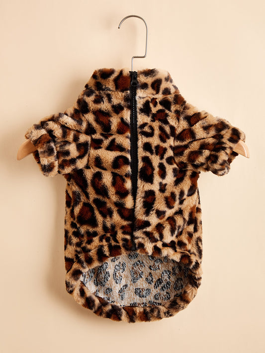 Plush leopard print dog jacket hanging on a wooden hanger showing front zipper and short sleeves