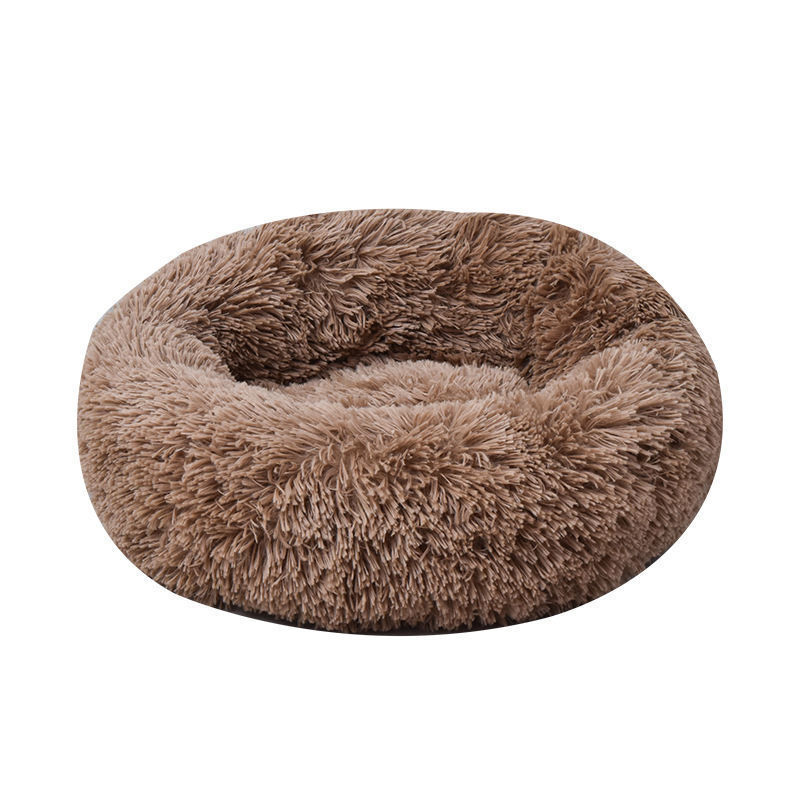 Mocha brown plush round pet bed isolated on white background with soft faux fur