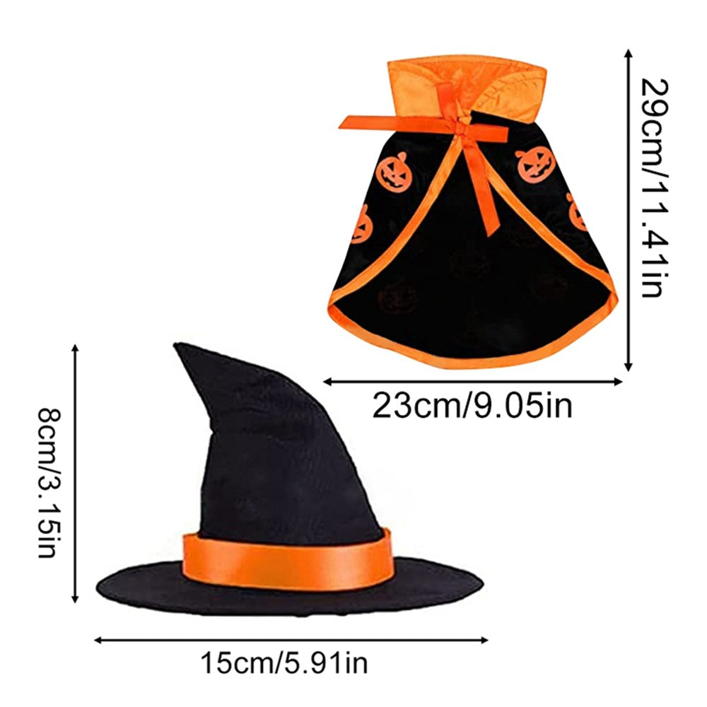 Black cape with orange pumpkin pattern and edging shown with 29cm length and 23cm width measurements