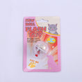 Cargar la imagen en la vista de la galería, Packaged interactive glowing cat toy ball with pink border and cat illustration on display card
