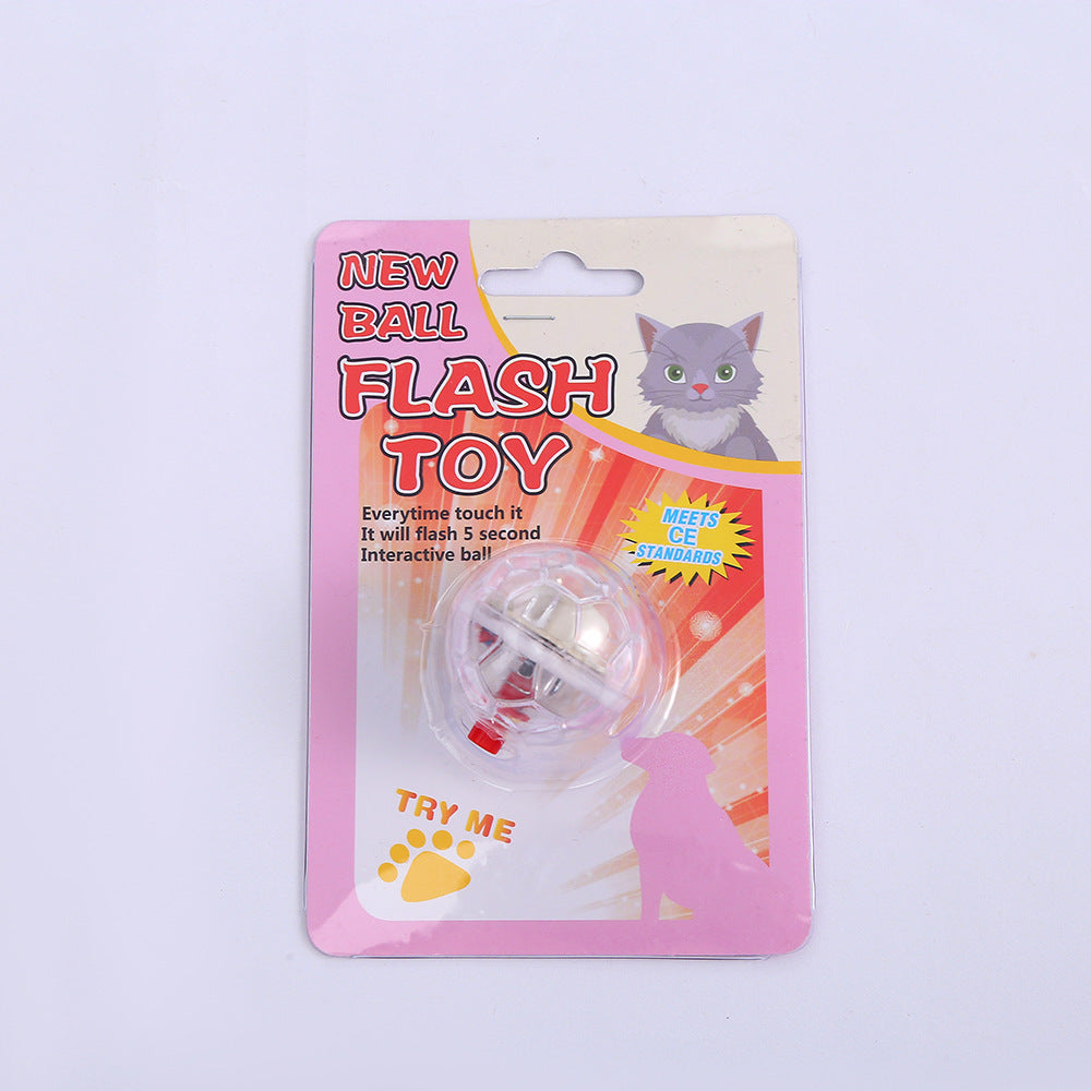 Packaged interactive glowing cat toy ball with pink border and cat illustration on display card