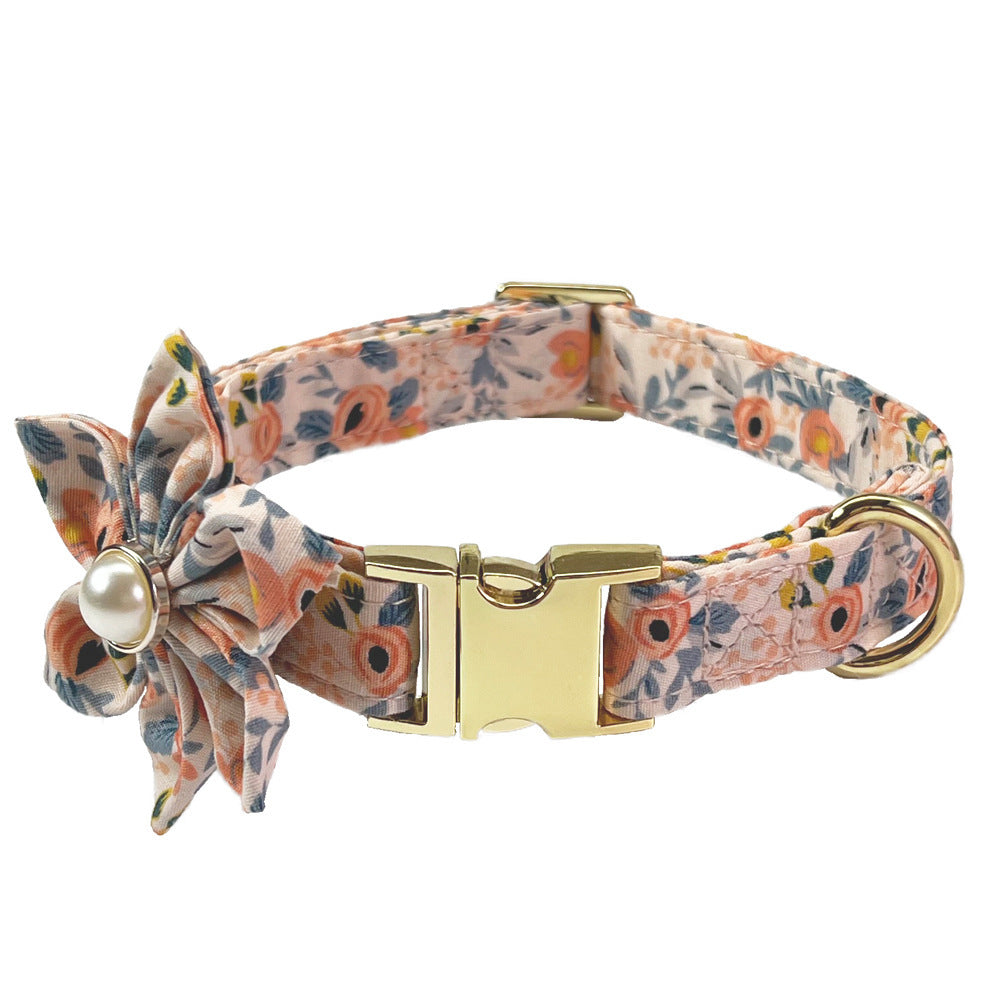 Peach floral dog collar featuring gold metal buckle with bow and pearl accent