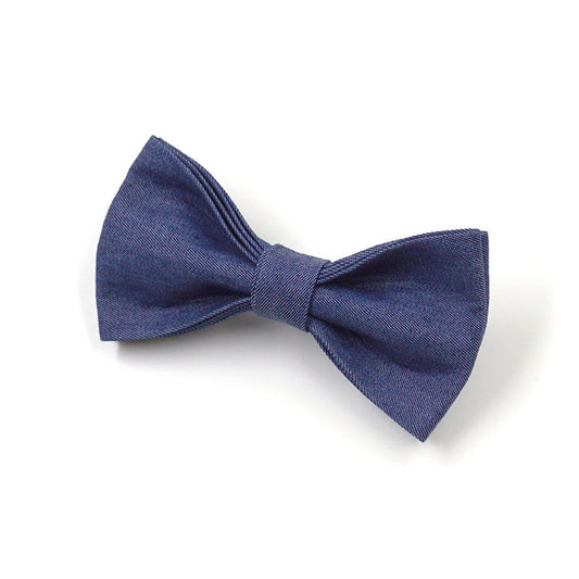 Close-up of deep denim fabric bow tie for dog collar