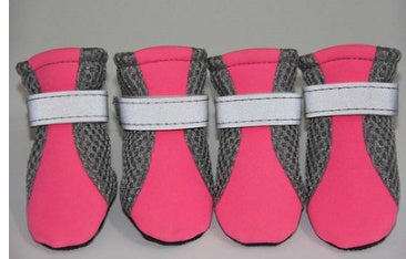 Four hot pink breathable dog shoes with gray mesh sides and white adjustable straps