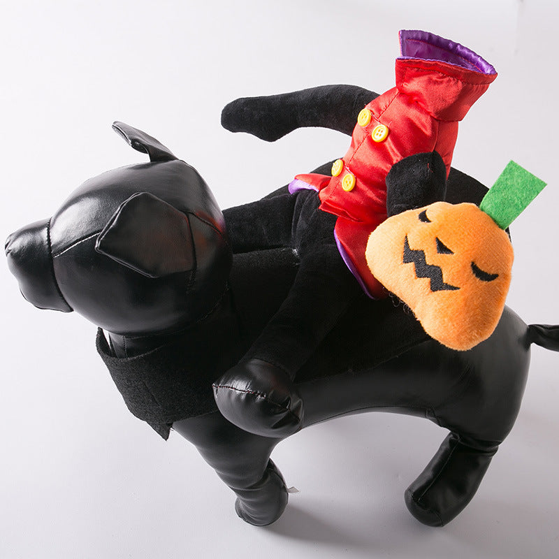 Black faux leather dog model wearing headless man costume sitting on its back with pumpkin plush