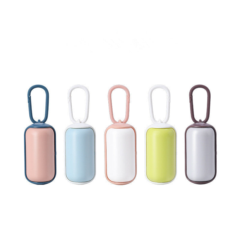 Lineup of five portable pet poop bag dispensers in different color combos: pink-blue, blue-white, pink-white, green-white, coffee