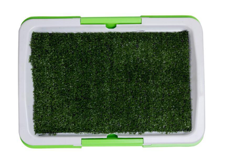 Top view of green artificial grass dog potty tray with gray and green frame