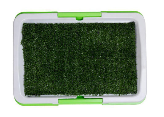 Top view of green artificial grass dog potty tray with gray and green frame