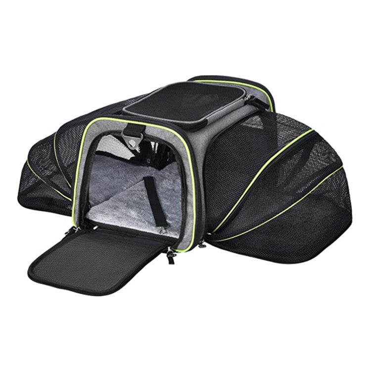Black and gray expandable pet carrier with yellow trim, plush gray cushion, open front door, and mesh expanded sides