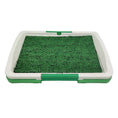 Charger l'image dans la visionneuse de la galerie, Close-up of indoor dog potty training toilet with green artificial grass patch and plastic frame
