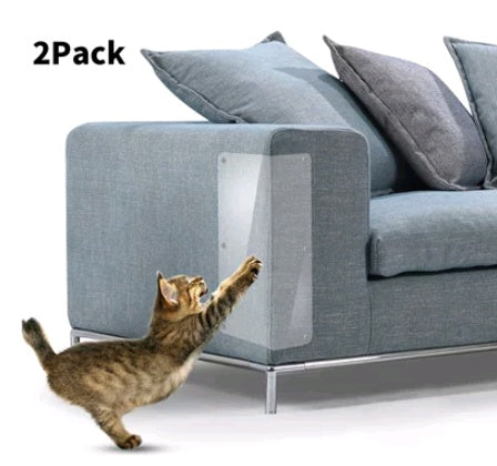 Cat claw protector pad applied on gray sofa corner with a cat scratching