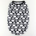 Charger l'image dans la visionneuse de la galerie, Flat lay of white dog shirt with black skull print and black neckline trim
