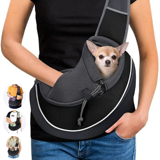 Woman wearing a black breathable pet sling carrier with small chihuahua inside