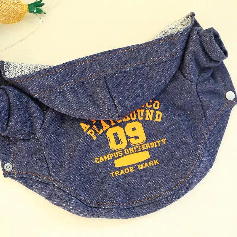 Side view of dog hoodie showing snap buttons and hood interior