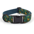 Load image into Gallery viewer, Close-up of adjustable green jungle print pet collar with black plastic buckle and D-ring
