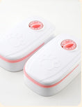 Charger l'image dans la visionneuse de la galerie, Two automatic pet feeders with white bodies and pink timer dials, lids closed, shown on white surface
