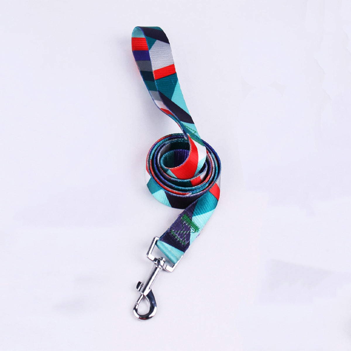 Green and white nylon dog harness with plastic buckle on white background